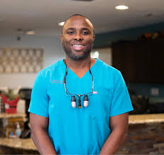 Dentist with patient